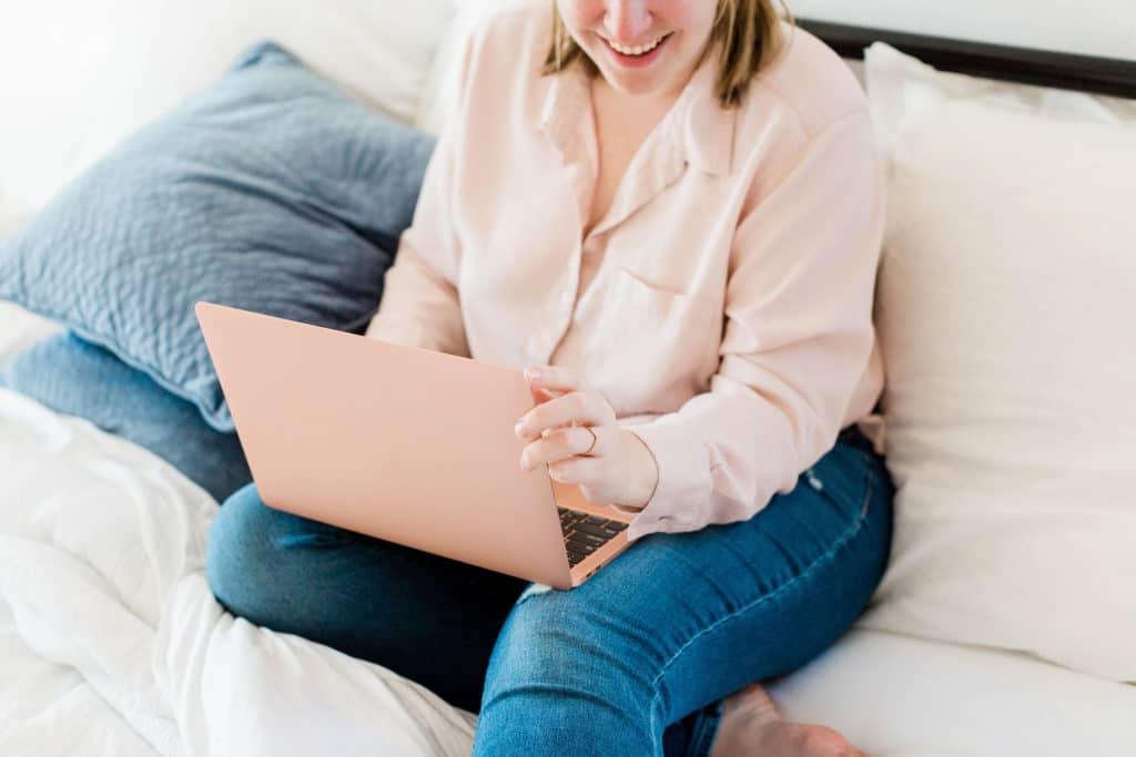 woman working on her follow up with laptop